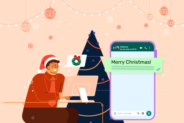 WhatsApp Christmas holiday messages: A brown man with short hair wearing a Santa hat sits in front of a computer and next to a Christmas tree. In a speech bubble coming out of his mouth, there is a wreath with a bow on top of it. The background is orange with various strings of lights and ornaments. On the right of the image, there is a smartphone opened to a WhatsApp chat with Katherine. The message from the sender in the chat says "Merry Christmas!", and the rest of the message is obscured from view.